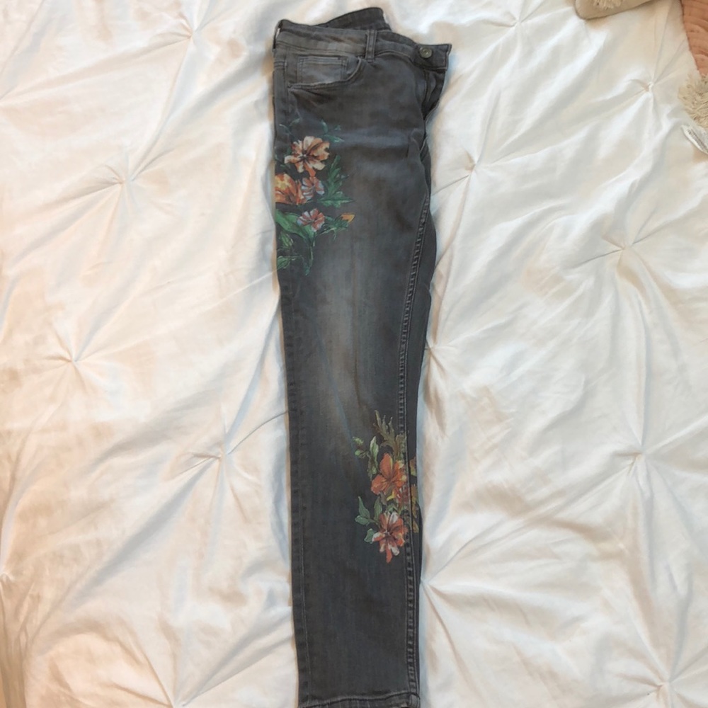 grey jeans with floral design